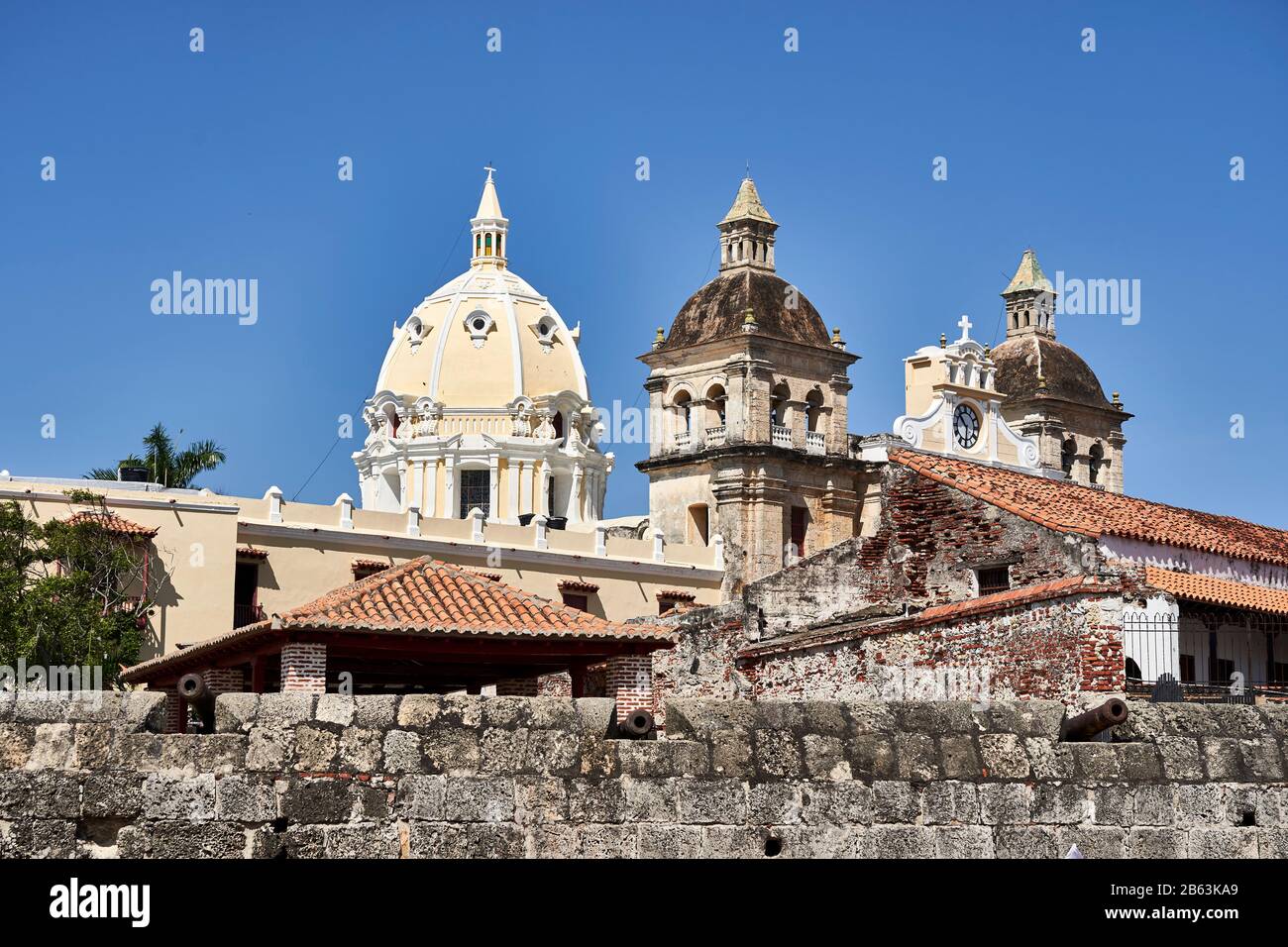 Rooftop view of church towers over defensive wall surrounding Cartagena. Stock Photo