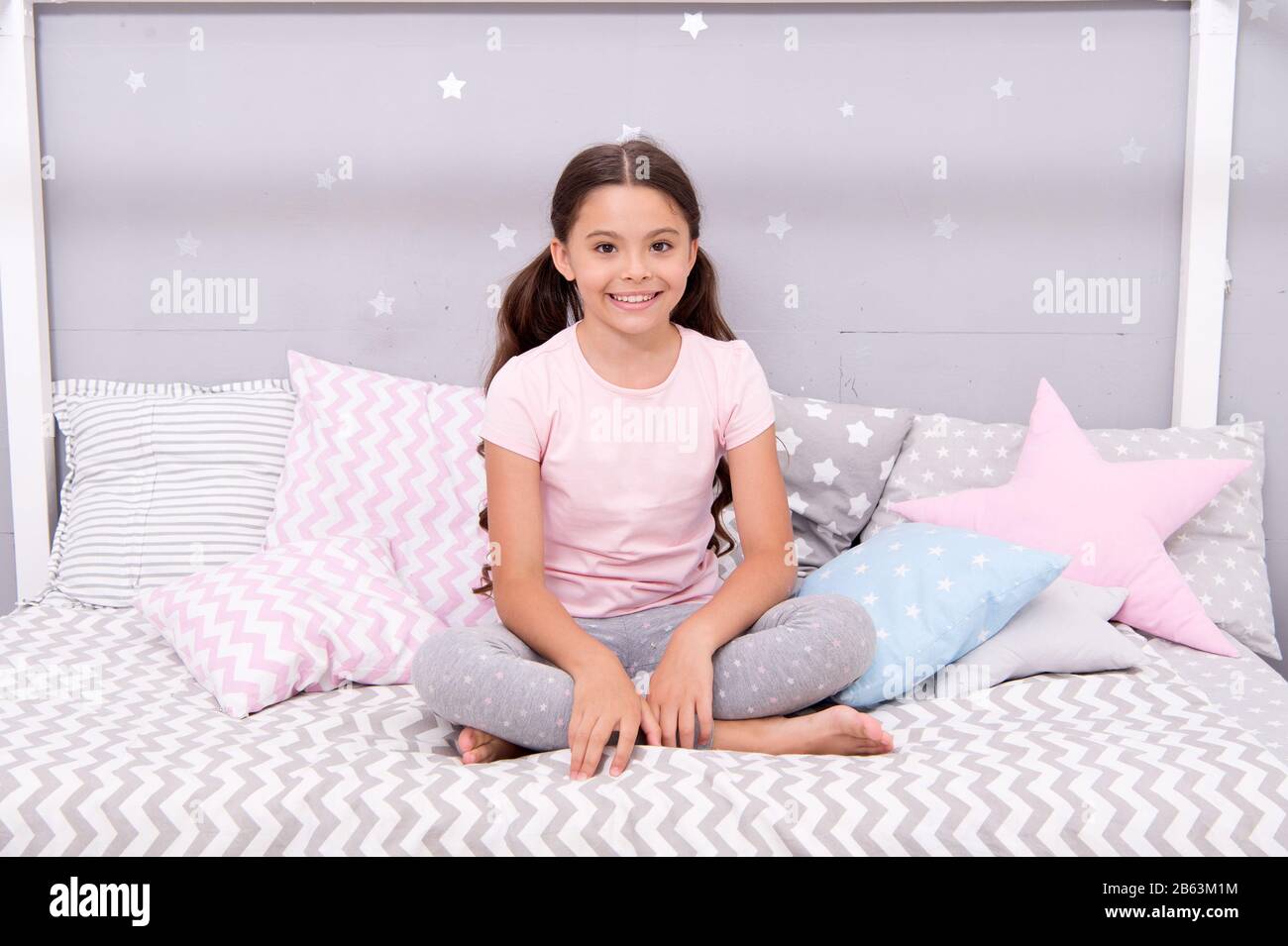 Feeling relaxed in pajamas. Little child wear pajamas to bed. Sleepwear and pajamas for kids. Home clothing. Nightwear. Bedtime routine. Fashion and style. Get your coziest sleep in stylish pajamas. Stock Photo