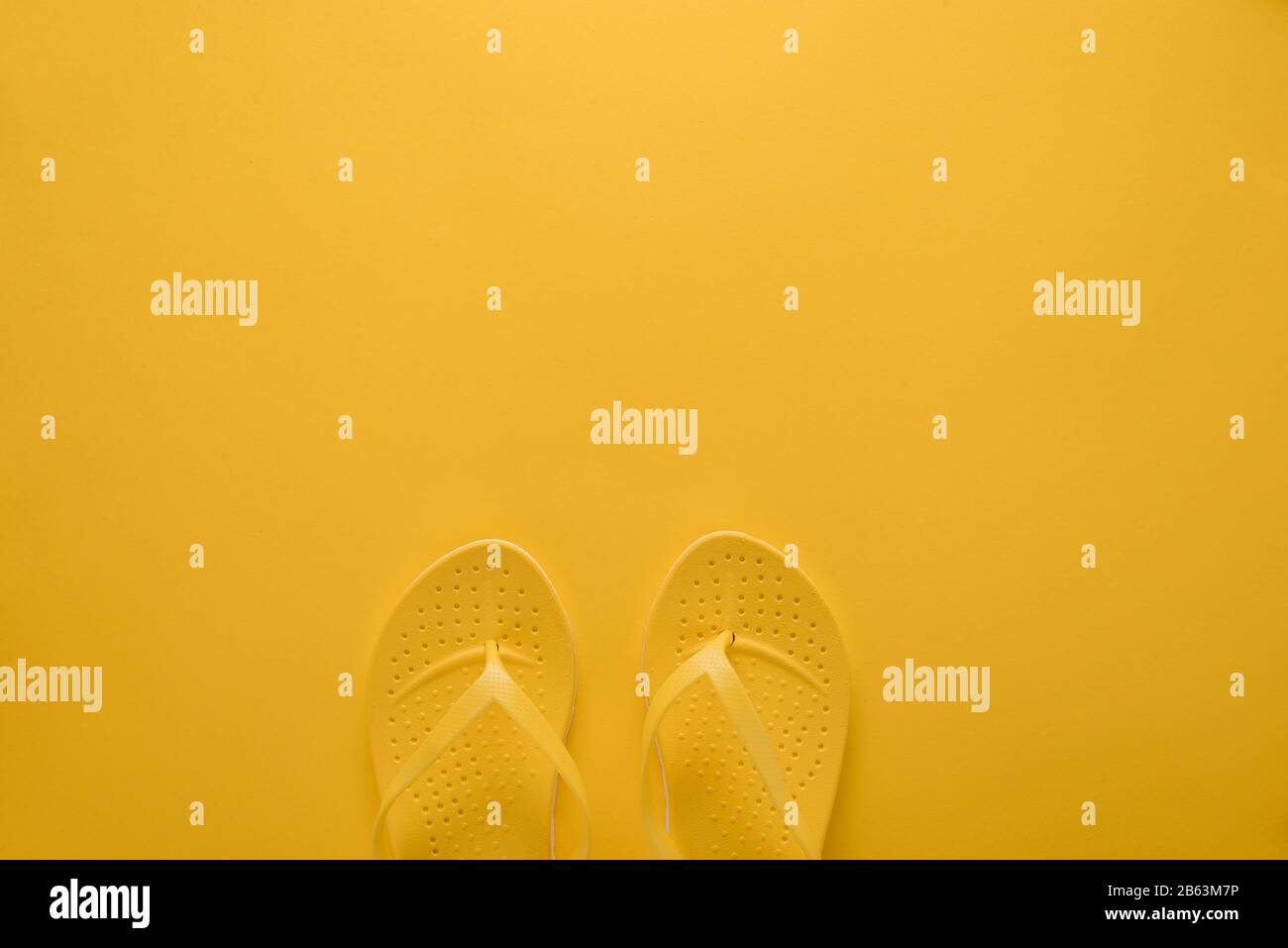 Yellow flip flop hi-res stock photography and images - Alamy