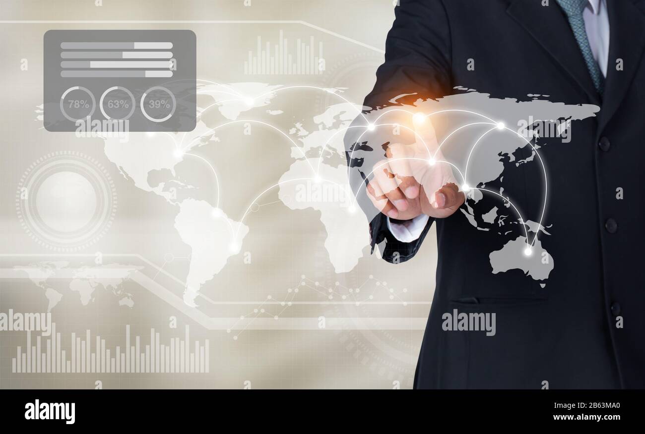 Businessman touching world map and graph on screen with his finger, Elements of this image furnished by NASA Stock Photo