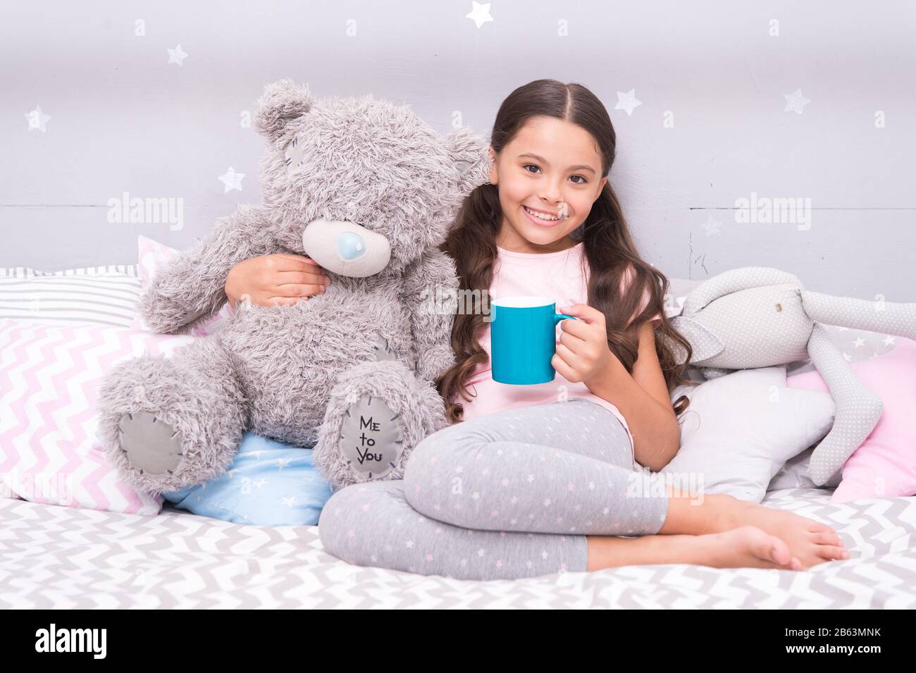 Drinking milk just before bed. Bedtime beverage. Hot milk before sleep