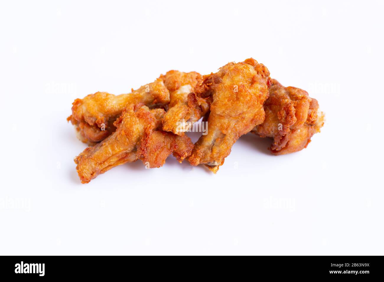 Fried chicken on white background. Copy space Stock Photo
