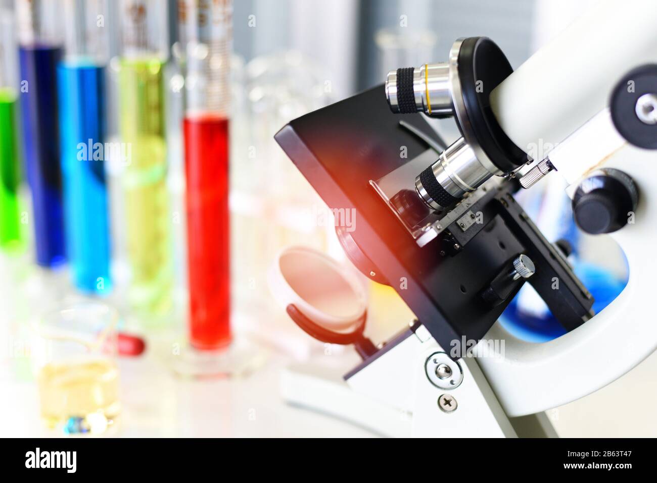 Microscope in modern lab for scientist research science or medical / microscope with metal lens