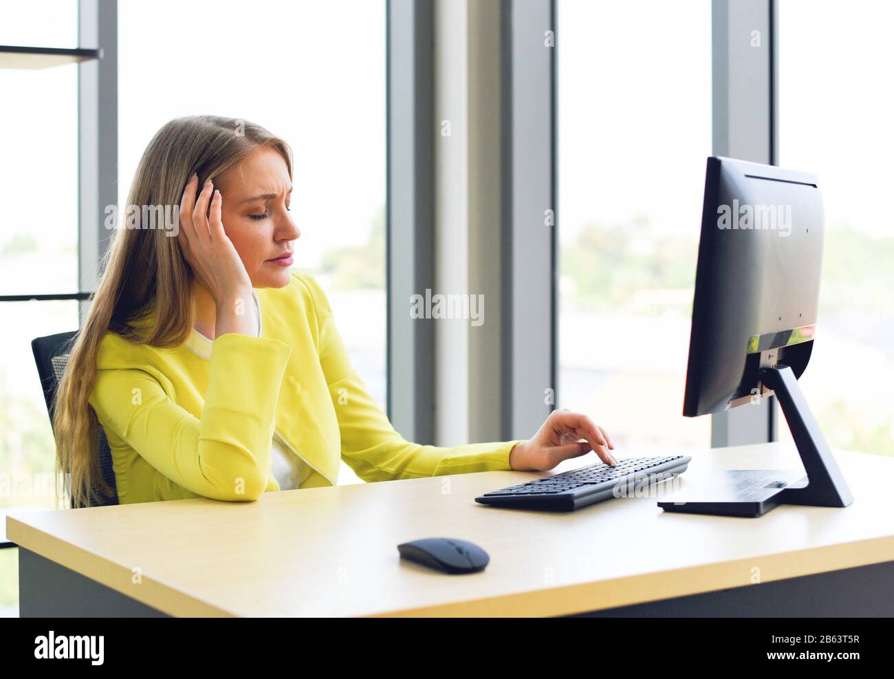 Business woman suffering stress working computer on the desk / Stressed ...