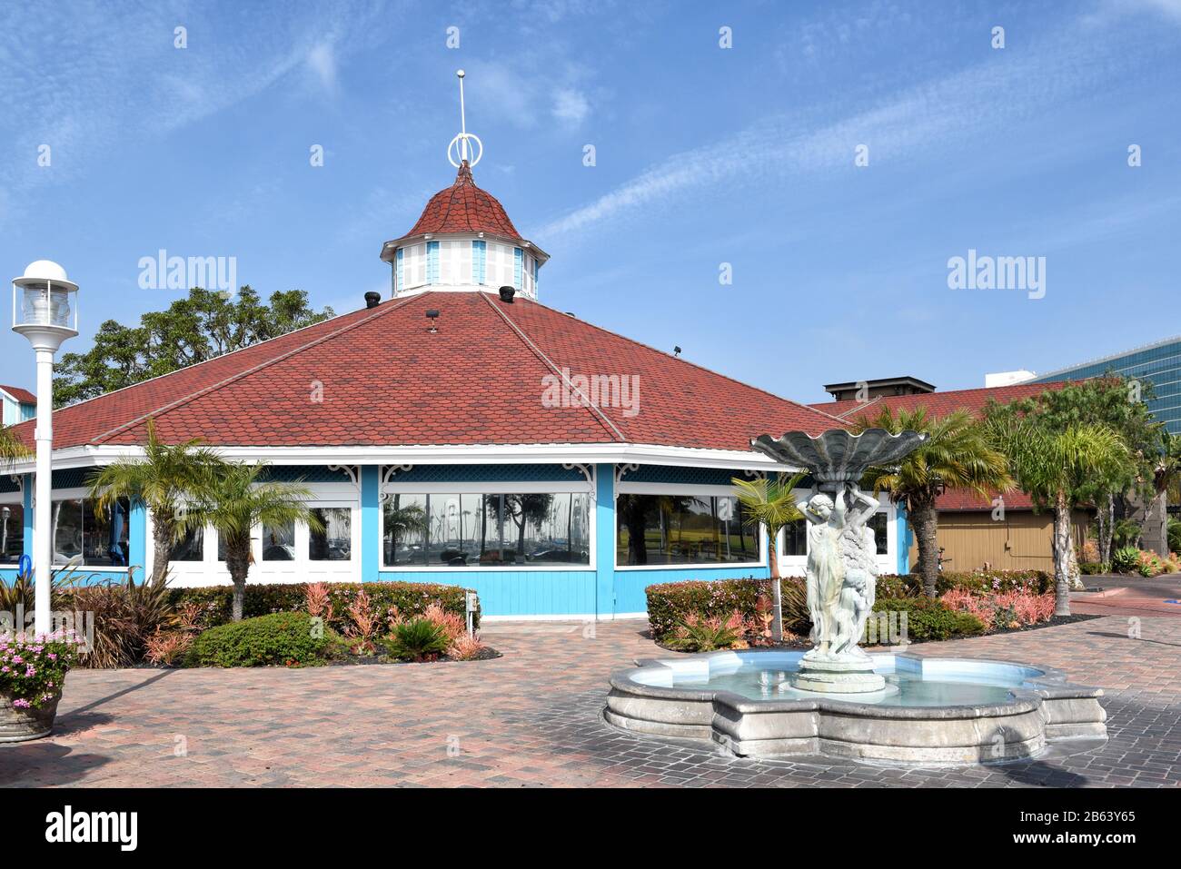 LONG BEACH, CALIFORNIA - 06 MAR 2020: Pelican Pier Pavilion, Shoreline Village at Rainbow Harbor, houses a carousel, video games, Skee-ball and Air Ho Stock Photo