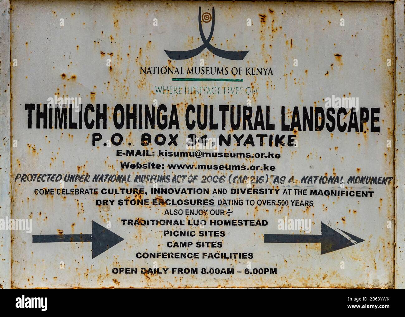 Thimlich Ohinga. Signage and information about stone-built ruins of historic 15th century Iron Age village enclosure, Kenya. Irregular shaped stones. Stock Photo