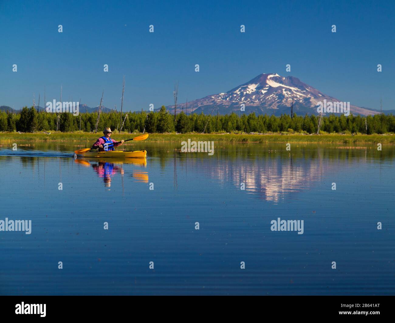 Kayaking on Crane Prairie Reservoir near La Pine, Oregon USA Stock