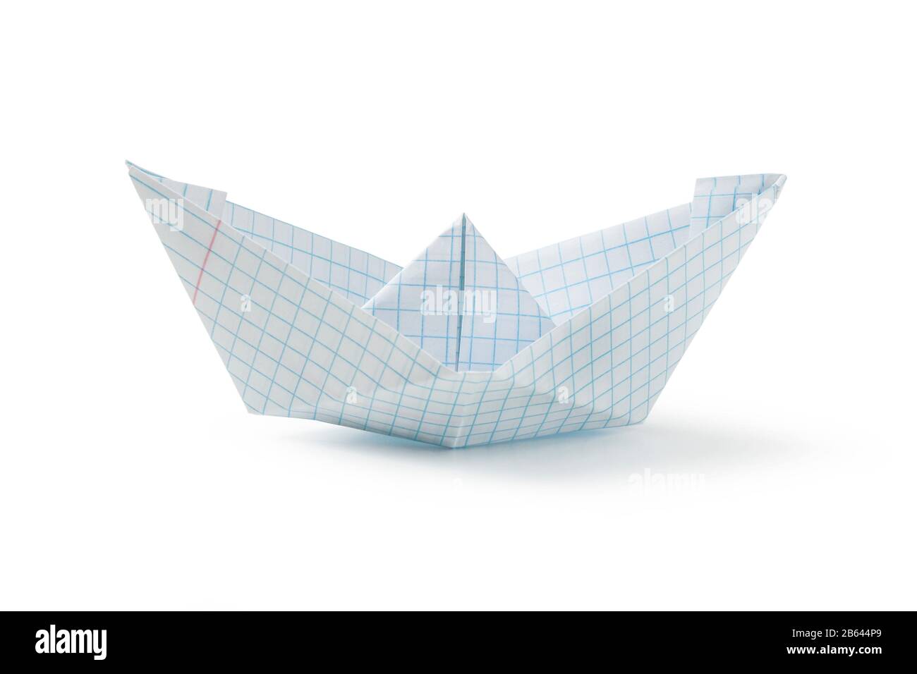 A paper boat from a school notebook sheet isolated on white Stock Photo