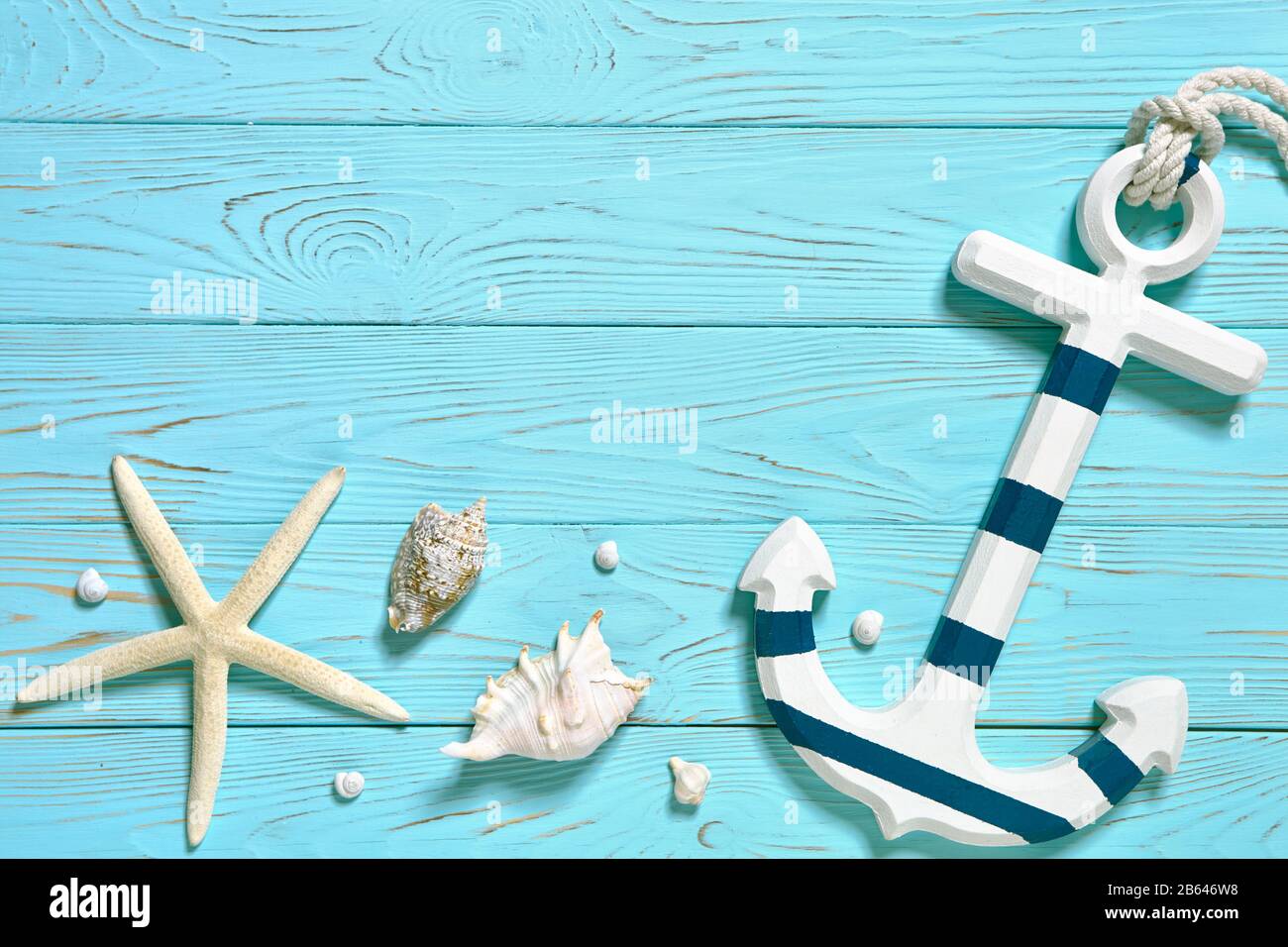 Marine accessories on a blue board.  Summer time sea vacation concept. Place for your text. Stock Photo