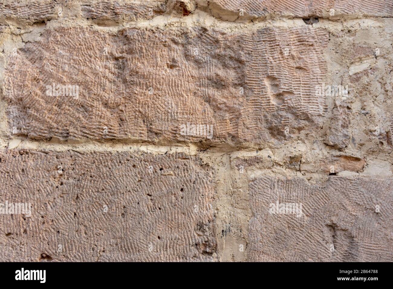 White and yellow dirty bricks background wall Stock Photo