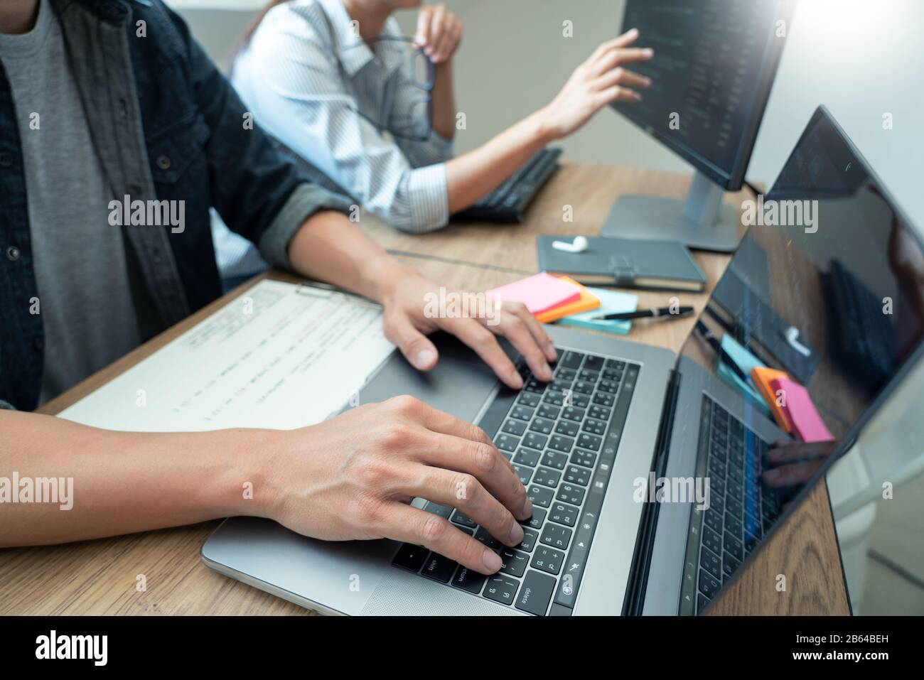Team of programmers working together development Website design and coding technologies in a software develop company office, Coworkers Team concept Stock Photo
