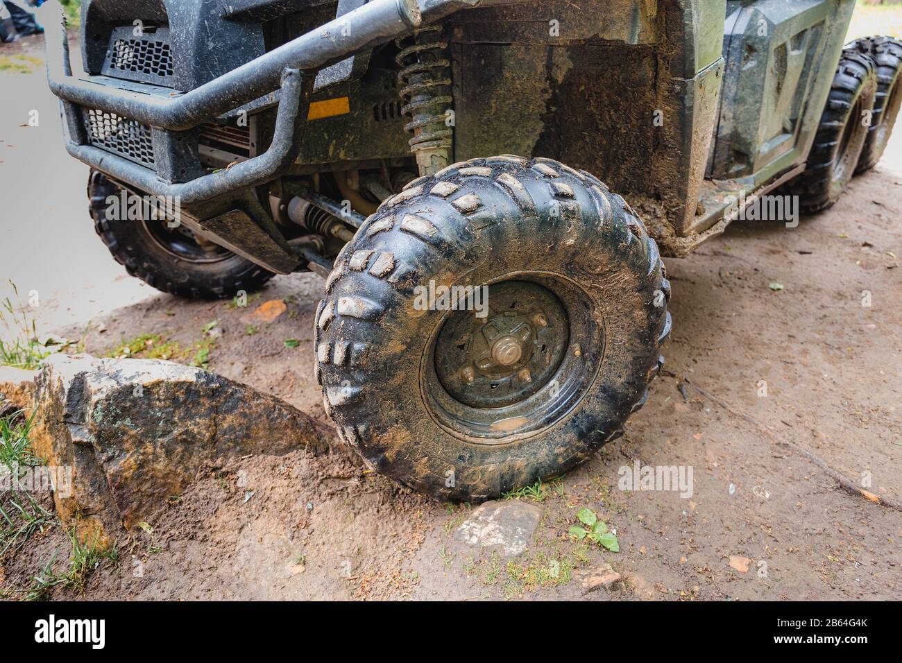 wheel all-terrain vehicle in the mud close-up Stock Photo