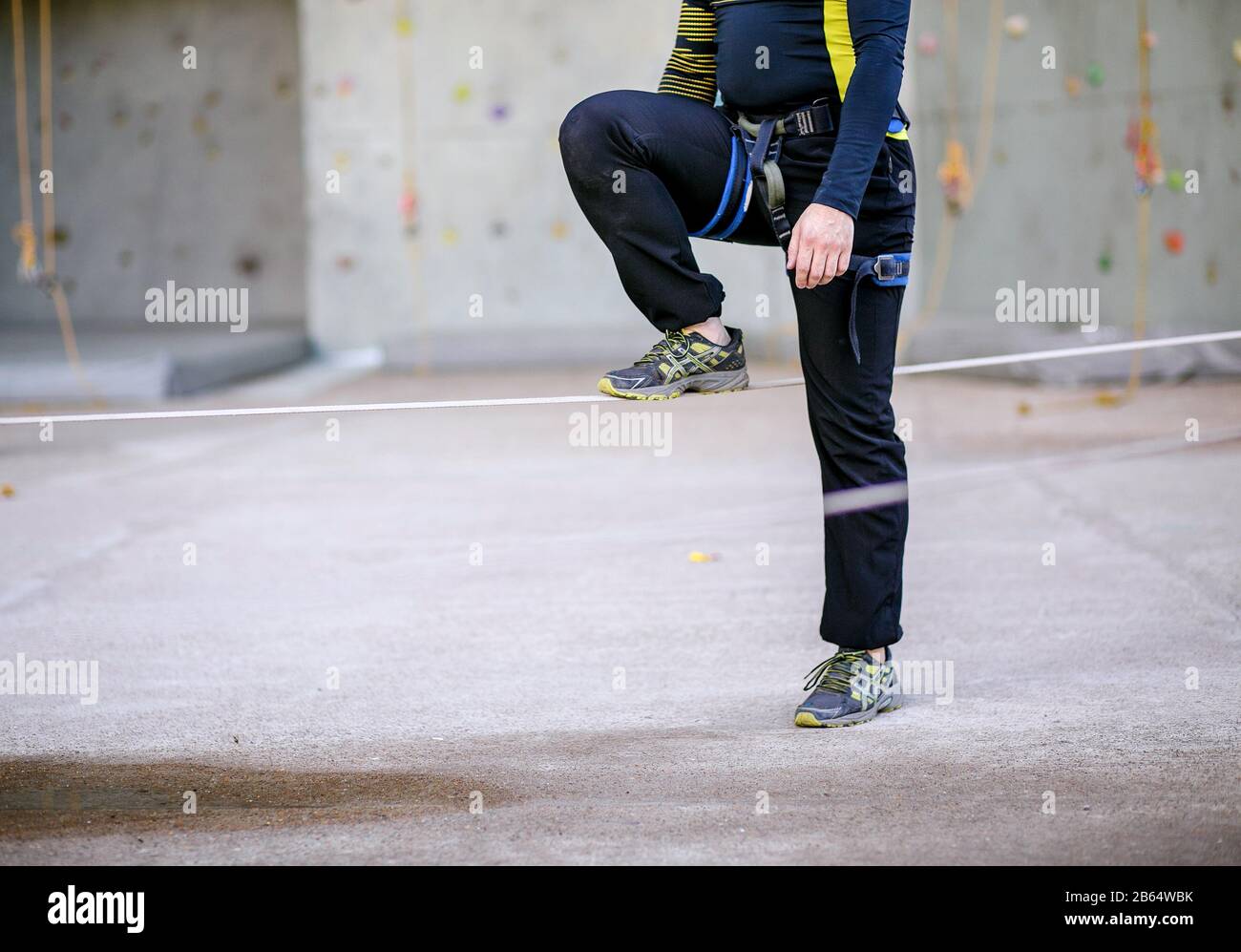 man walking on Slackline Stock Photo Alamy