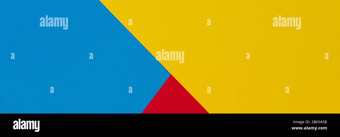 Abstract yellow, red and light blue color paper geometry composition ...