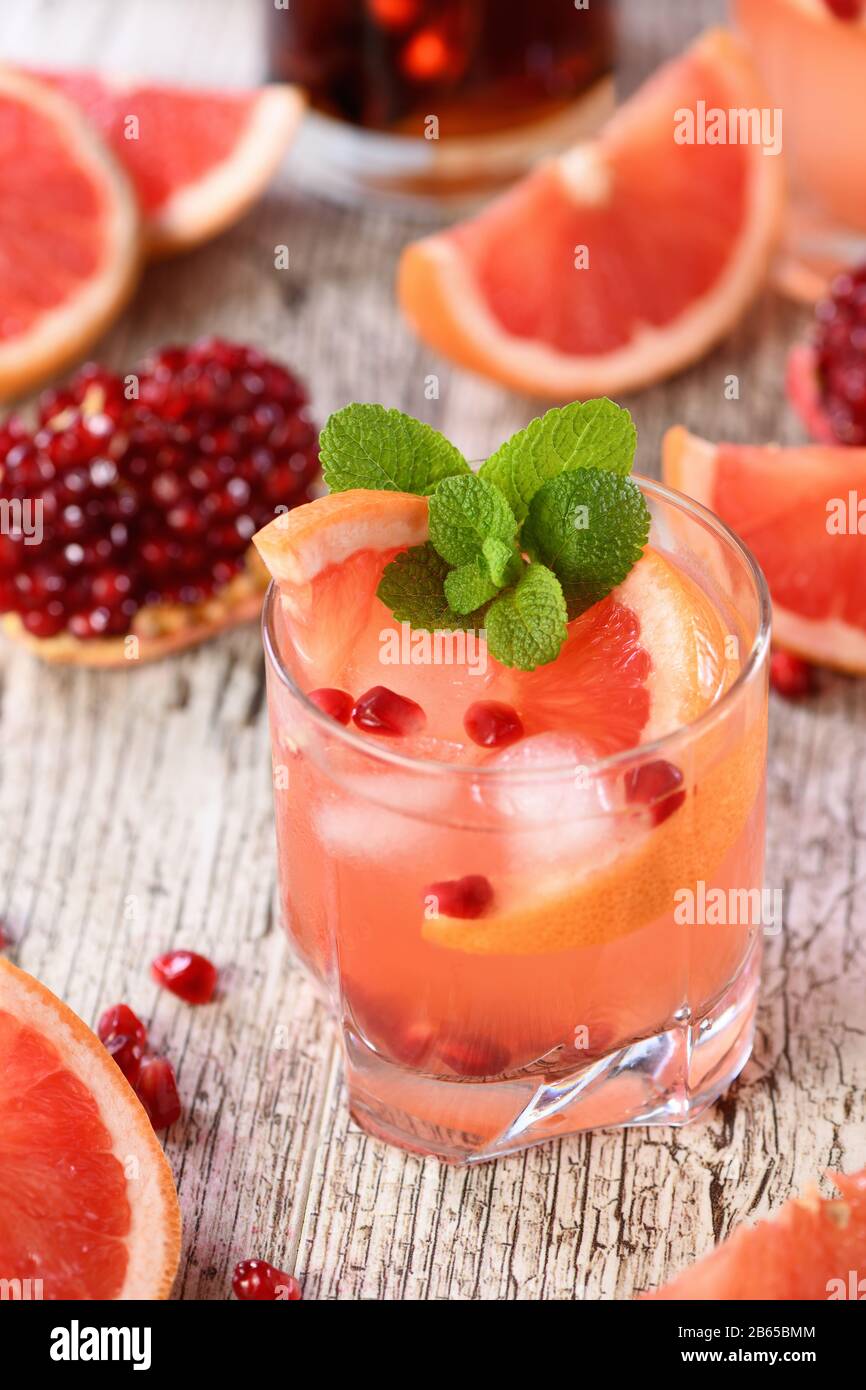 Tequila cocktail with pomegranate and grapefruit juice, tinted with the
