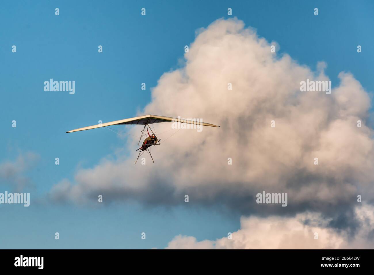 Hang glider wing with small engine. Ultralight plane Stock Photo