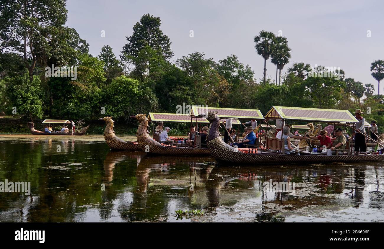 gondolas in the moats of Angkor Thom   gondolas in the moats of Angkor Thom Stock Photo