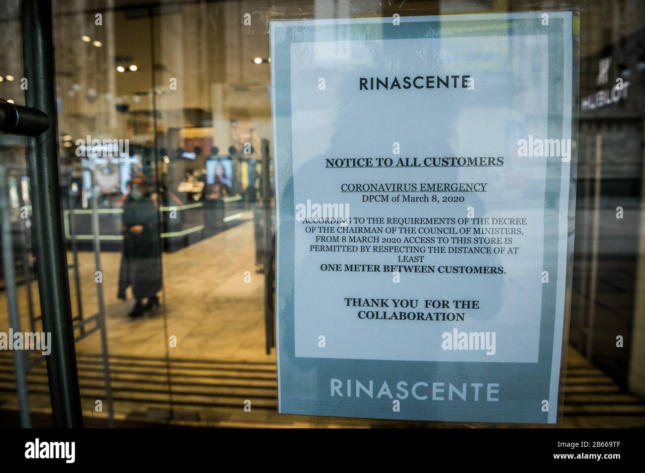 Milan. Galleria center, corso vittorio emanuele and cathedral with few people and shops closed due to COVID19 Coronavirus Editorial Usage Only Stock Photo