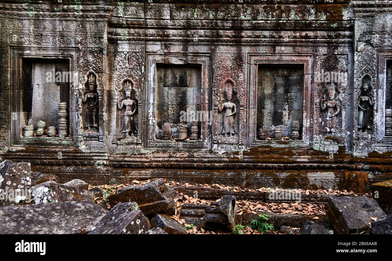 Cambodia-Angkor Ta ProhmSandstone sculpture of Apsara Devata. An Apsara or Apsarasa is a female spirit of the clouds and waters in Hindu and Buddhist mythology. Deva is the Hindu term for deity, devatas are a kind of smaller more focused devas Stock Photo