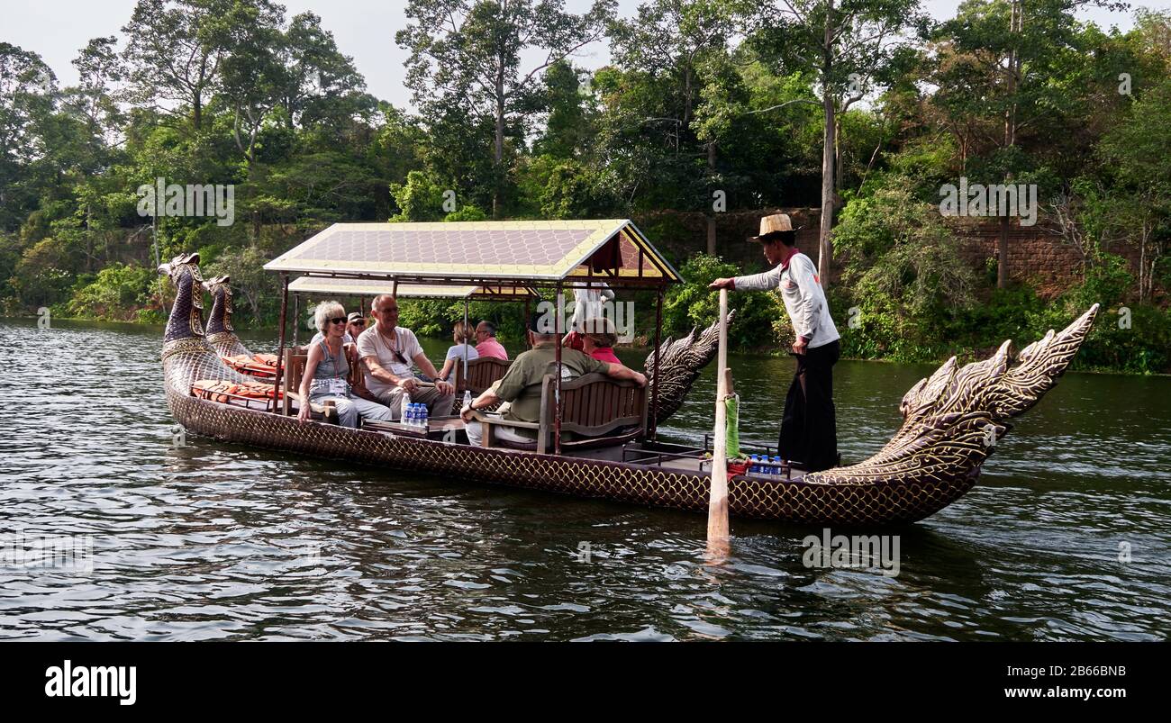 gondolas in the moats of Angkor Thom   gondolas in the moats of Angkor Thom Stock Photo