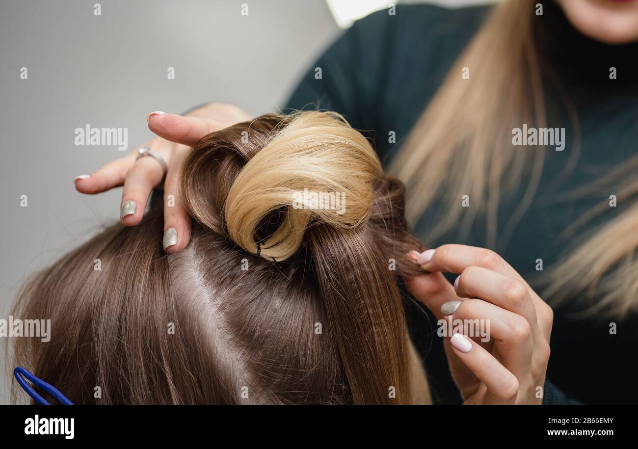 High bun hair woman hi-res stock photography and images - Alamy