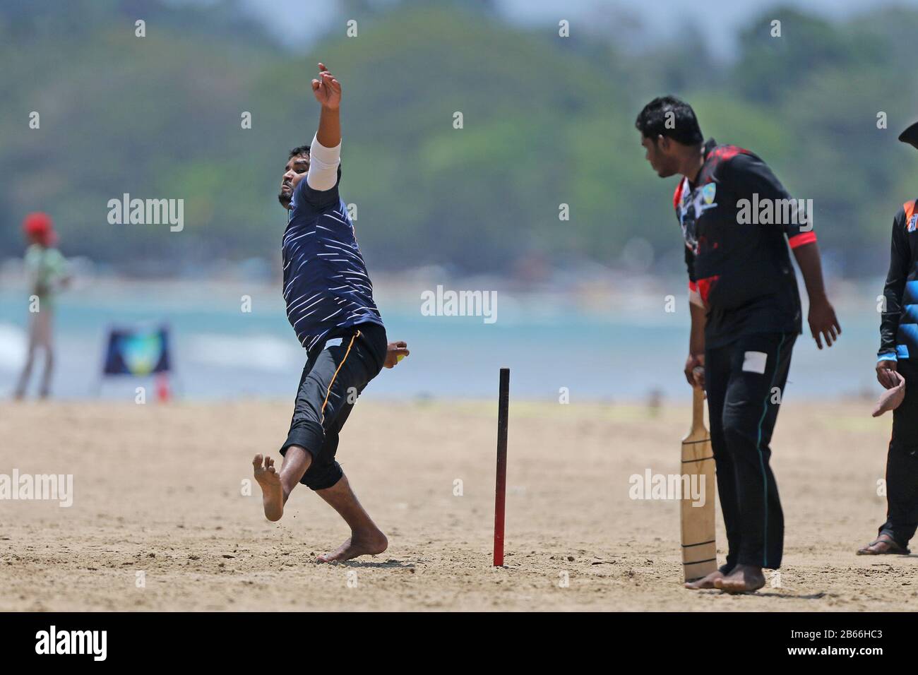 Sri Lankan cricket fans play a game of cricket on the beach at Galle, Sri Lanka 08 March 2020 (Photo: Nick Atkins /ESPA-Images) Stock Photo