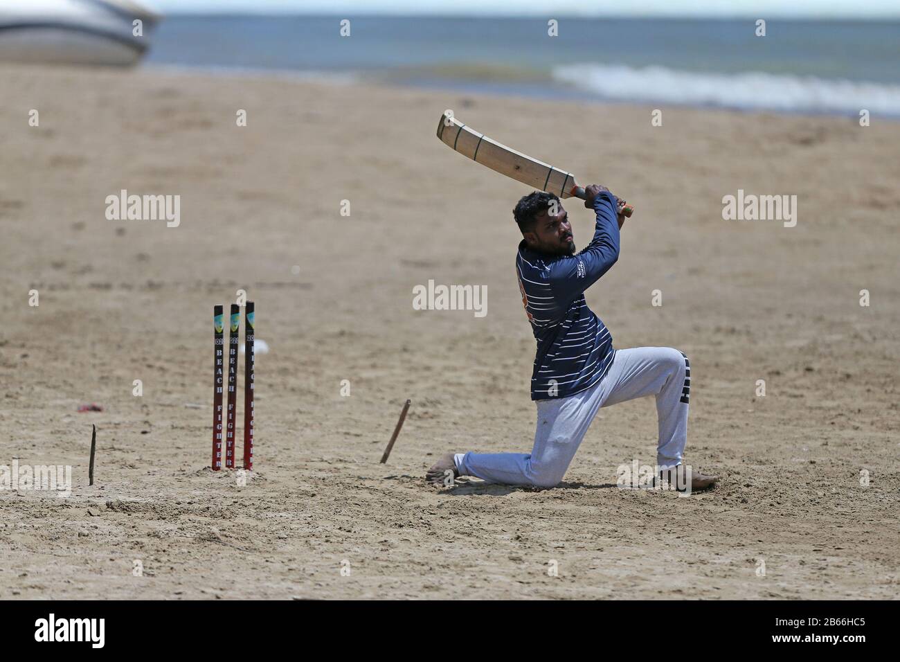 Sri Lankan cricket fans play a game of cricket on the beach at Galle, Sri Lanka 08 March 2020 (Photo: Nick Atkins /ESPA-Images) Stock Photo