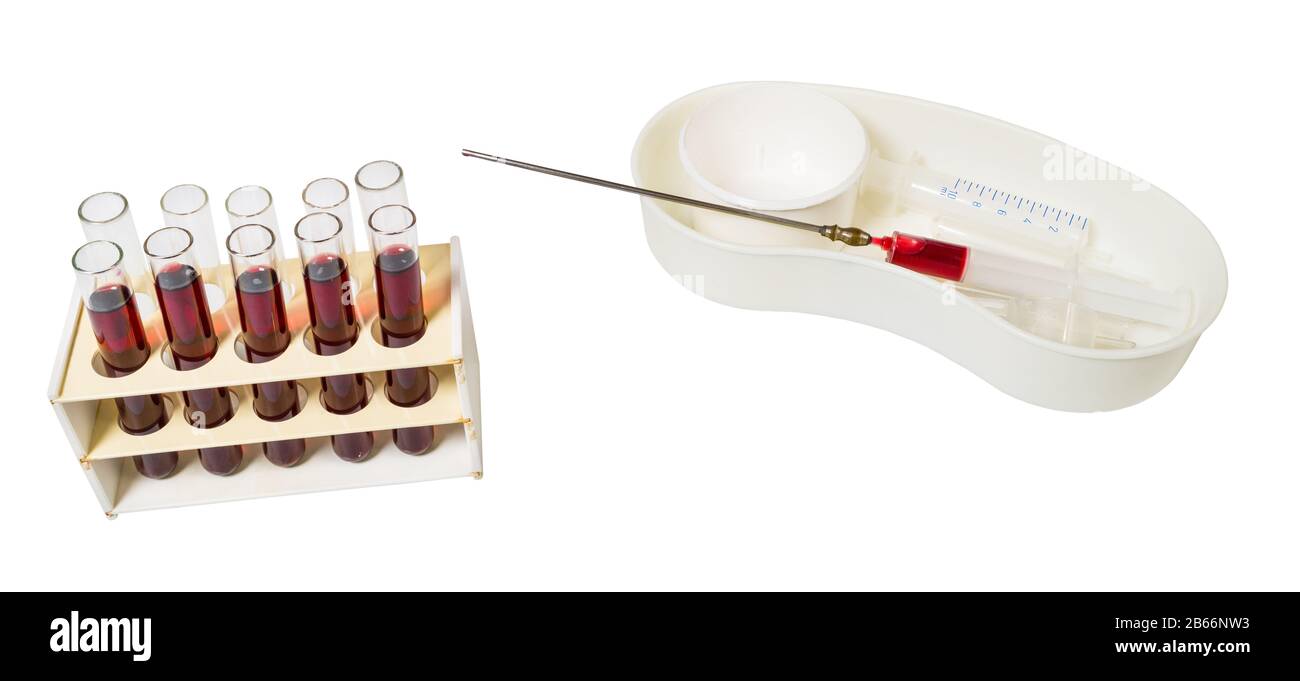 Medical laboratory equipment. Group of glass test tubes with red liquid ...