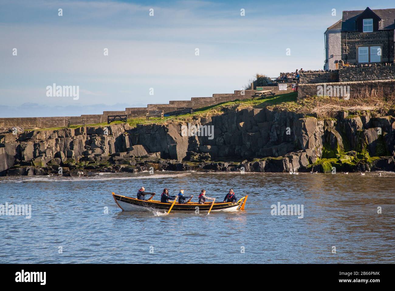 Rowing boat the Jolly Fisherman in Craster harbour, Northumberland UK Stock Photo