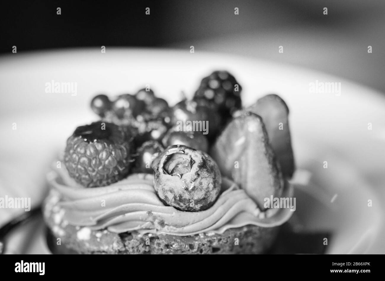delicious fresh fruits tart with vanilla & pistachio cream Stock Photo