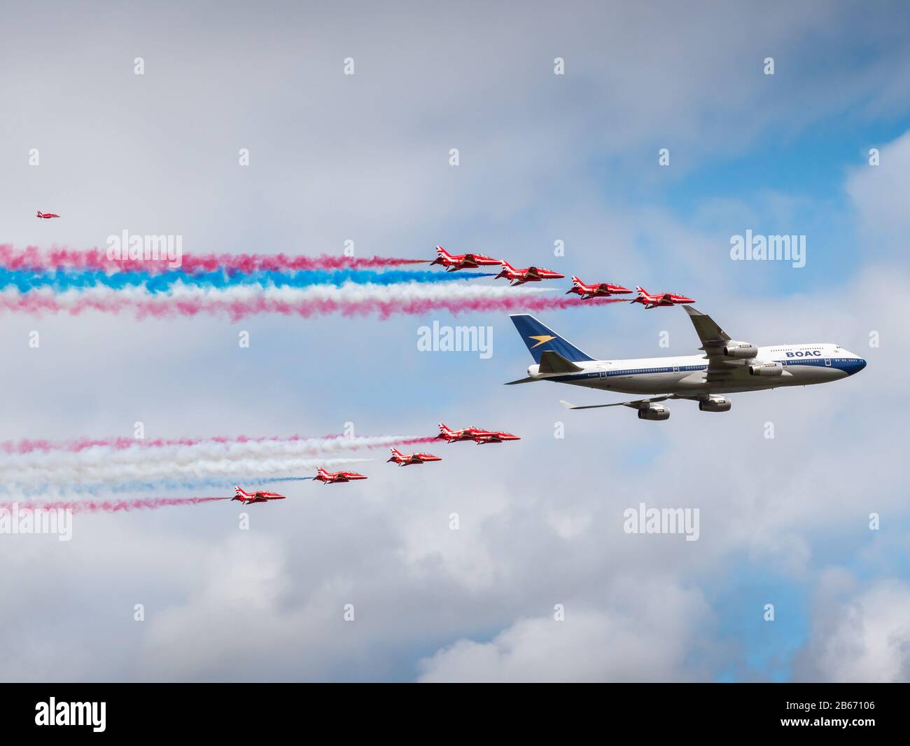 A BOAC British Airways Boeing 747-436 and Red Arrows fly past at the RIAT 2019, Fairford Gloucestershire UK Stock Photo