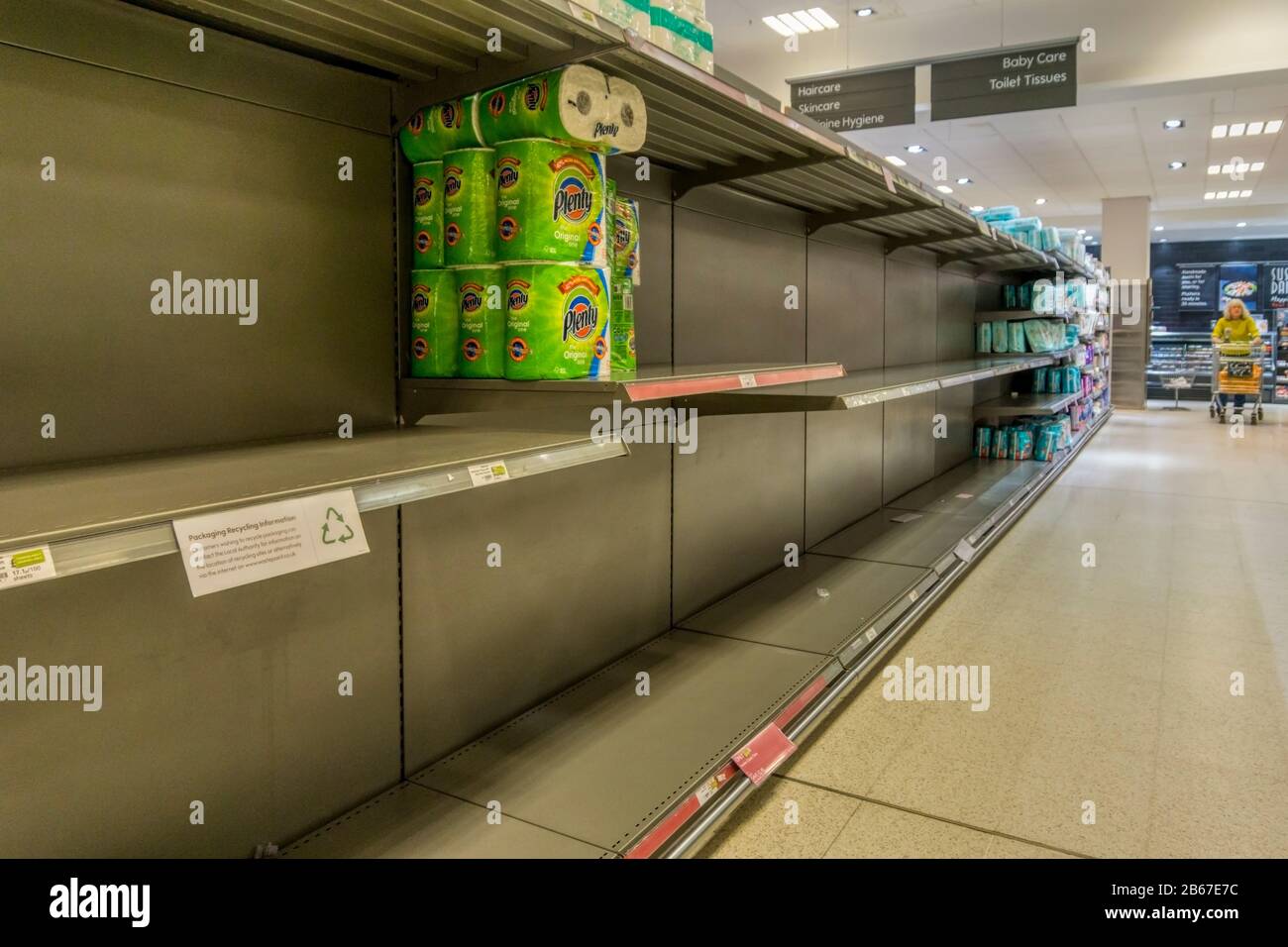 10 March 2020. Bromley, South London, UK. Nothing but a few packets of kitchen roll on the empty shelves in a south London supermarket, that should be stocked with toilet paper.  Emptied by people panic buying in the face of the Covid 19 Coronavirus scare.  Credit UrbanImages-News/Alamy Stock Photo