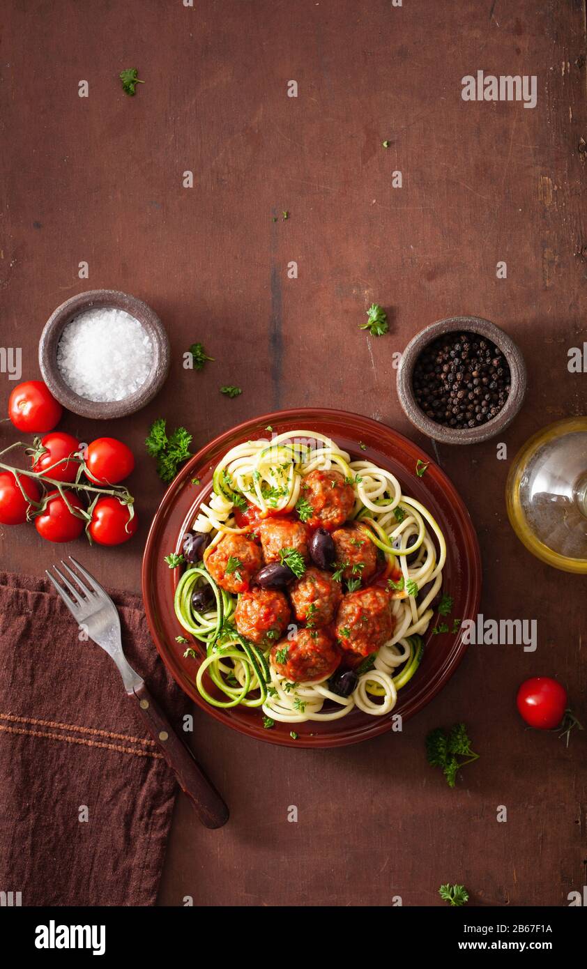 keto paleo zoodles zucchini noodles with meatballs and olives Stock