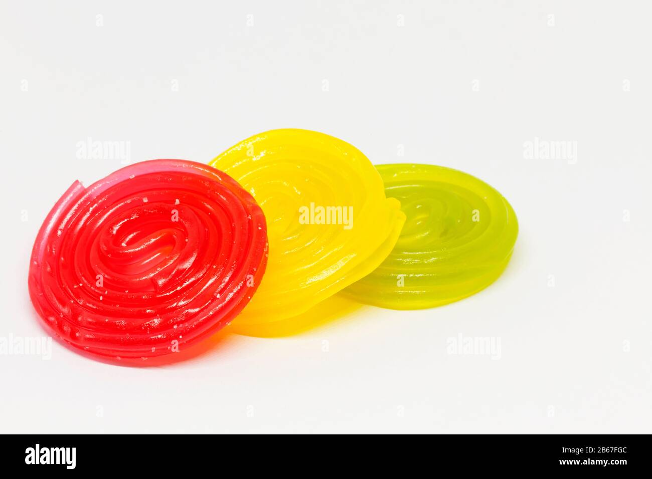 candy laces in three different colors on white background Stock Photo