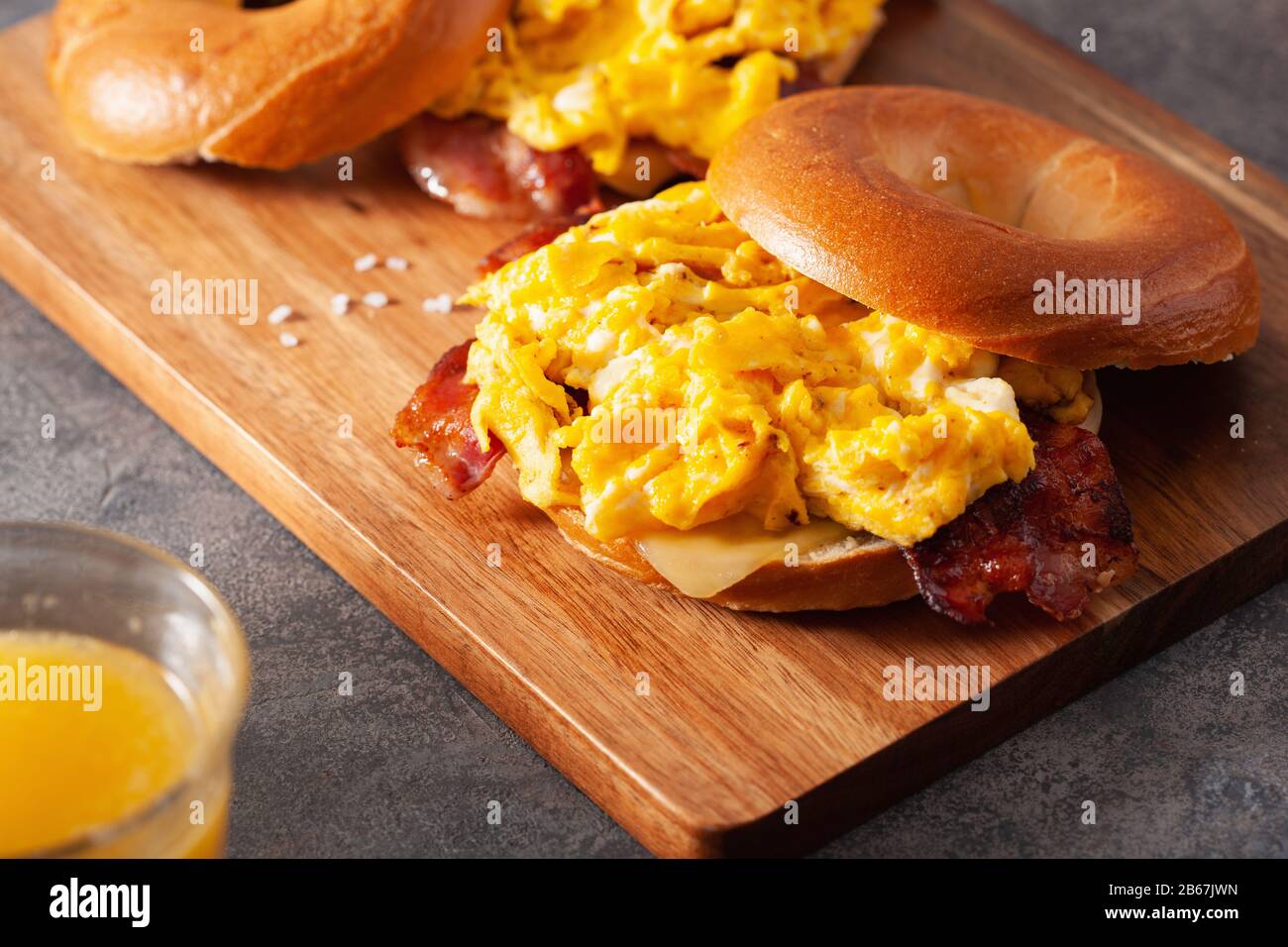 breakfast egg and bacon sandwich on bagel with cheese Stock Photo - Alamy