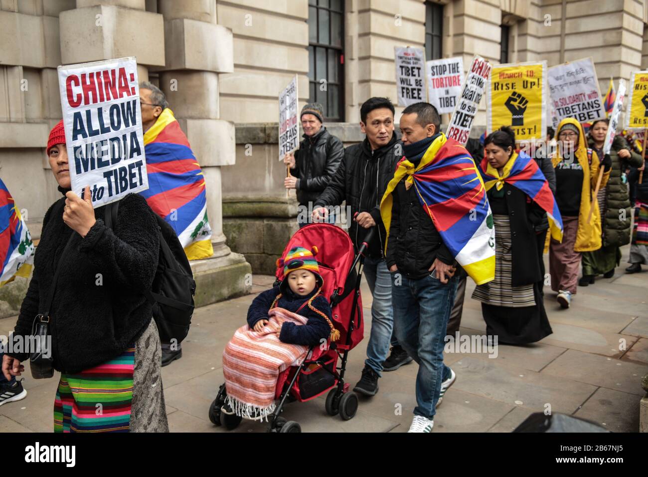 London UK 10 March 2020  The Tibetan community in London Marching from Downing Street ti the Chinese Embassy in London to demand and end of occupation by China ,and free Tibet ,today marks the 61st anniversary since the 10 of March of 1959 when China invaded Tibet . Credit: Paul Quezada-Neiman/Alamy Live News Stock Photo