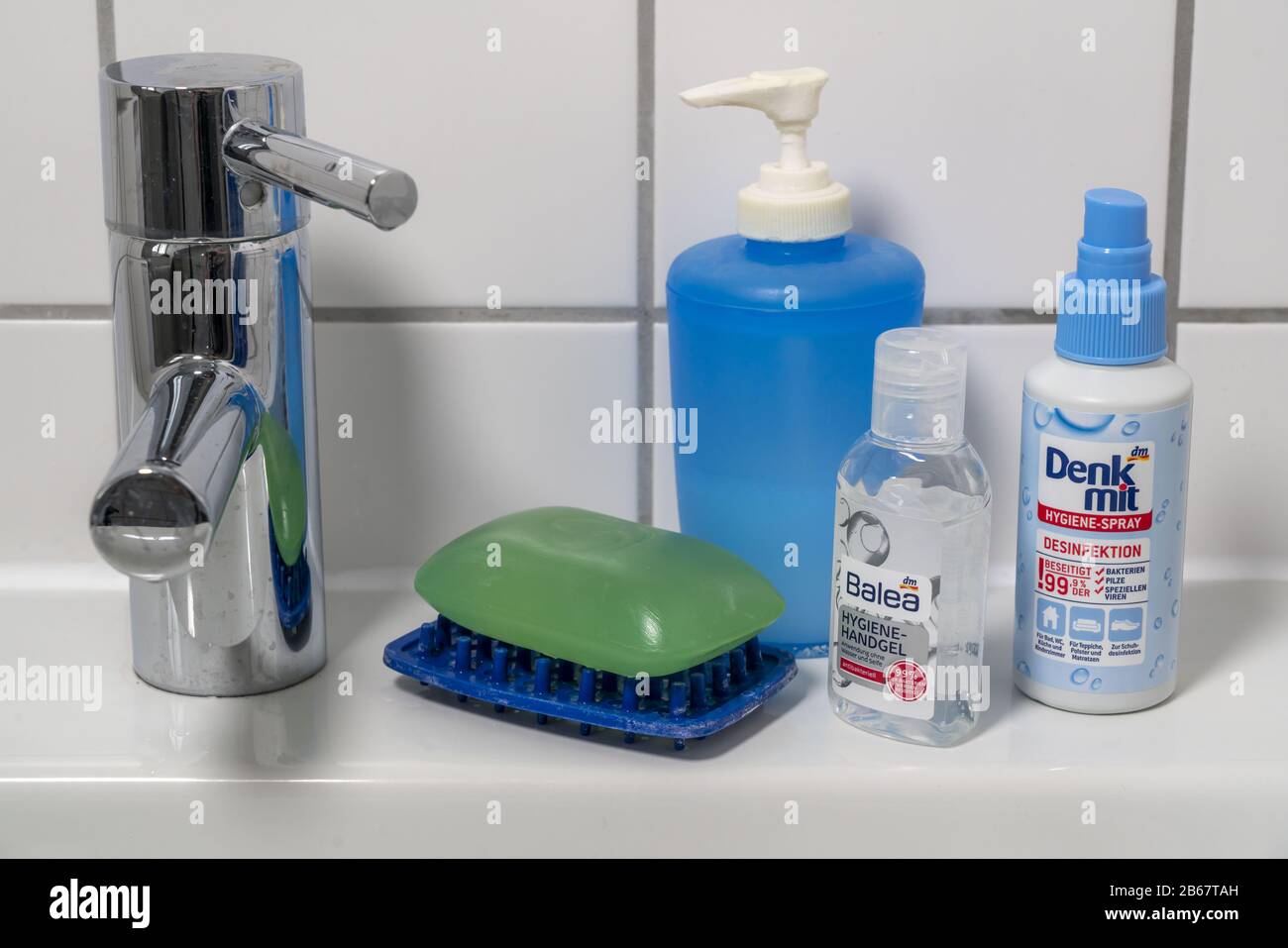 Domestic hygiene, washing hands, hygiene hand gel, bar of soap, liquid soap from the soap dispenser, disinfection spray, Stock Photo
