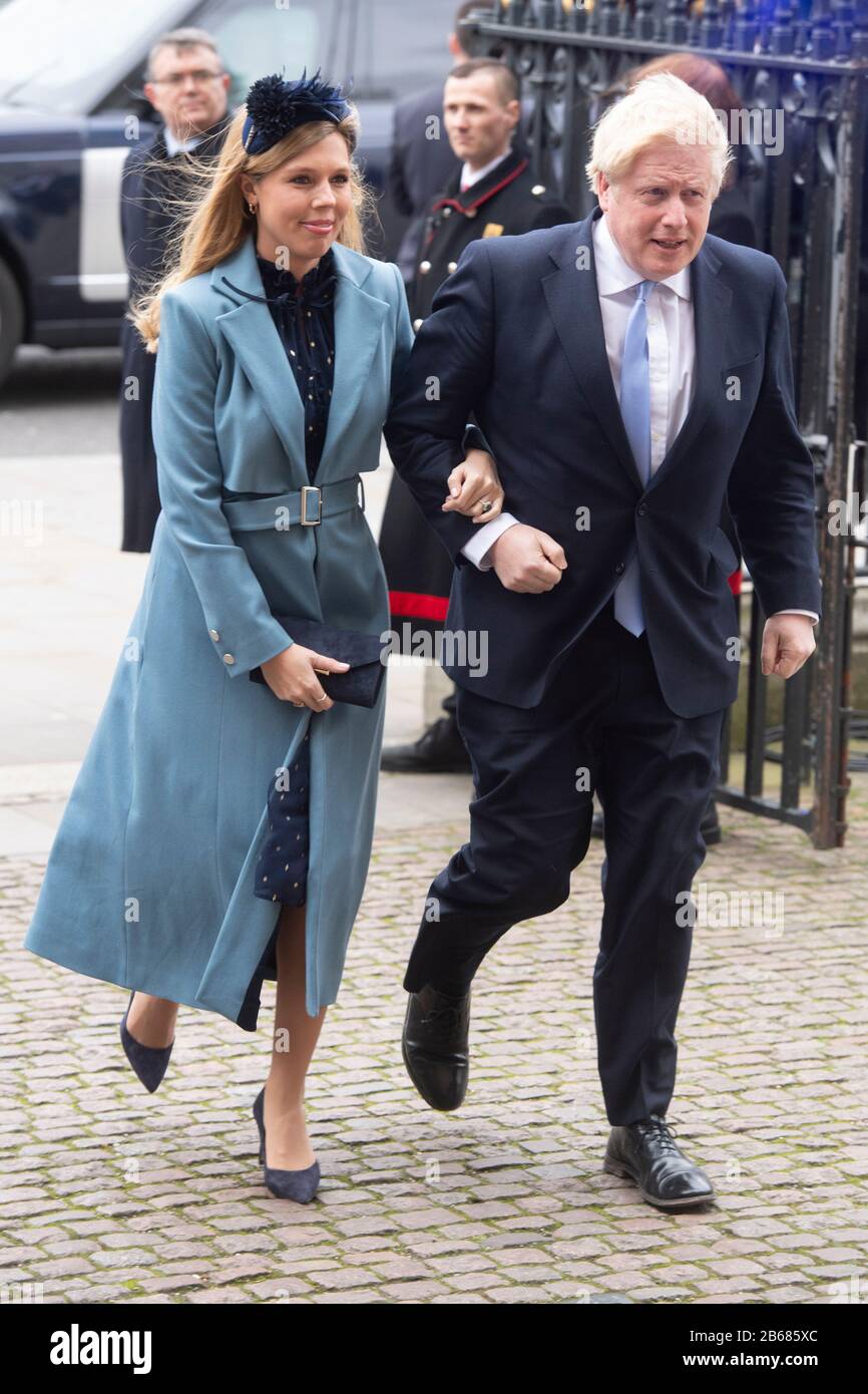 London, Britain. 9th Mar, 2020. British Prime Minister Boris Johnson (R) and his partner Carrie Symonds arrive at the Westminster Abbey to attend the annual Commonwealth Service on Commonwealth Day in London, Britain, March 9, 2020. Credit: Ray Tang/Xinhua/Alamy Live News Stock Photo