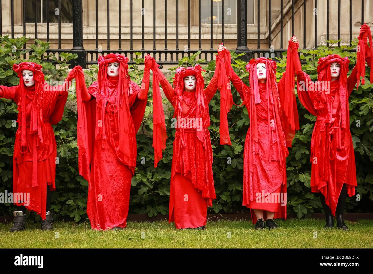 London, UK, 11 Jun 2019. Red Rebel Brigade, Extinction Rebellion - protest at Trafalgar Square. Credit: Waldemar Sikora Stock Photo