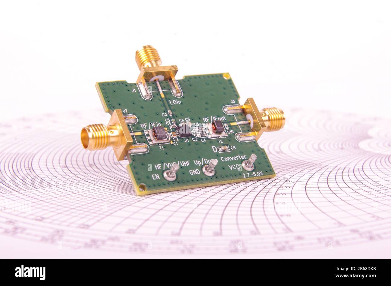 Radio frequency mixer printed circuit board PCB in front of Smith chart
