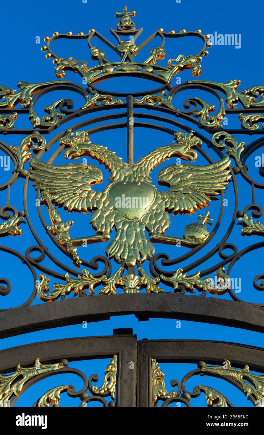 Tsarskoye Selo, Saint Petersburg, Russia - 29 February 2020: Glittering golden double-headed eagle - the coat of arms of Russian Empire and Russian Fe Stock Photo