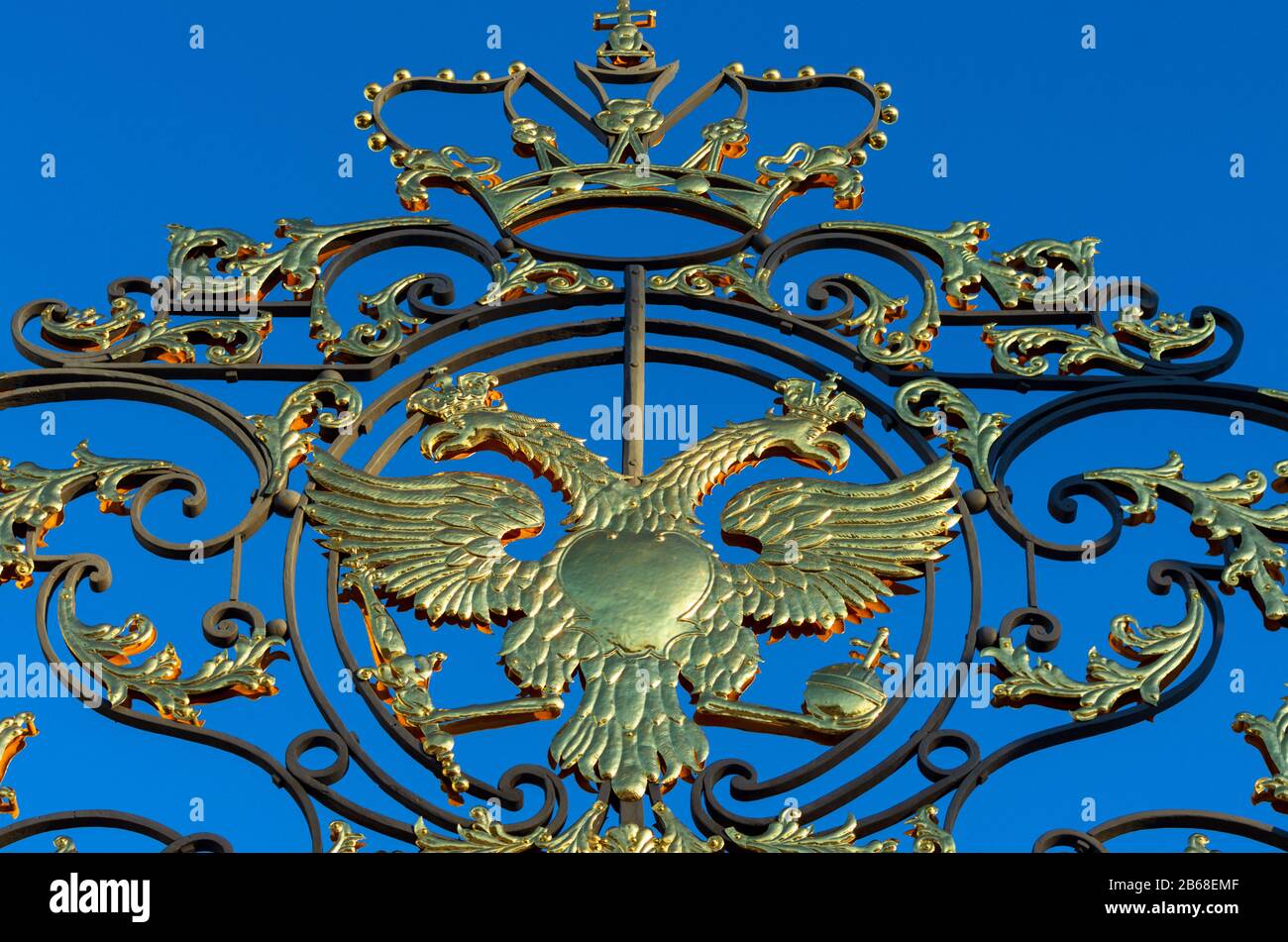 Tsarskoye Selo, Saint Petersburg, Russia - 29 February 2020: Glittering golden double-headed eagle - the coat of arms of Russian Empire and Russian Fe Stock Photo