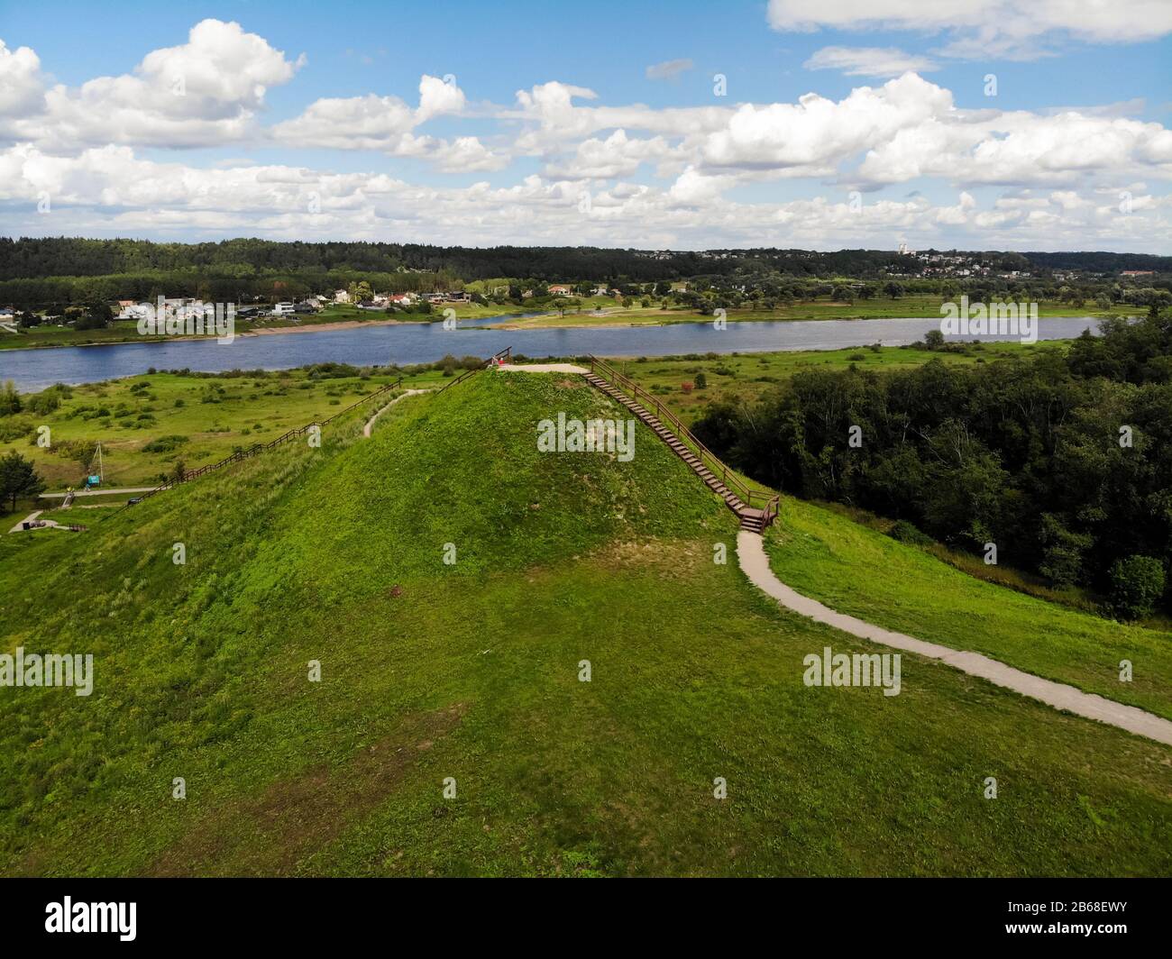 Historical Pypliai mound in Kacergine town, Lithuania. Aerial view Stock Photo