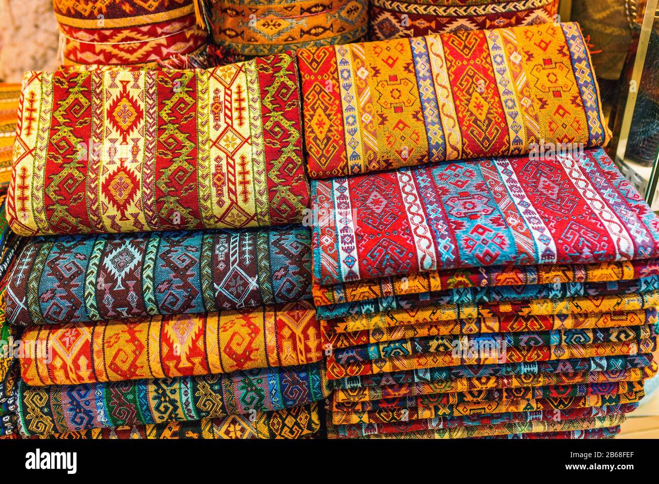 Various traditional colorful and vintage turkey oriental fabrics and rugs for sale at Grand