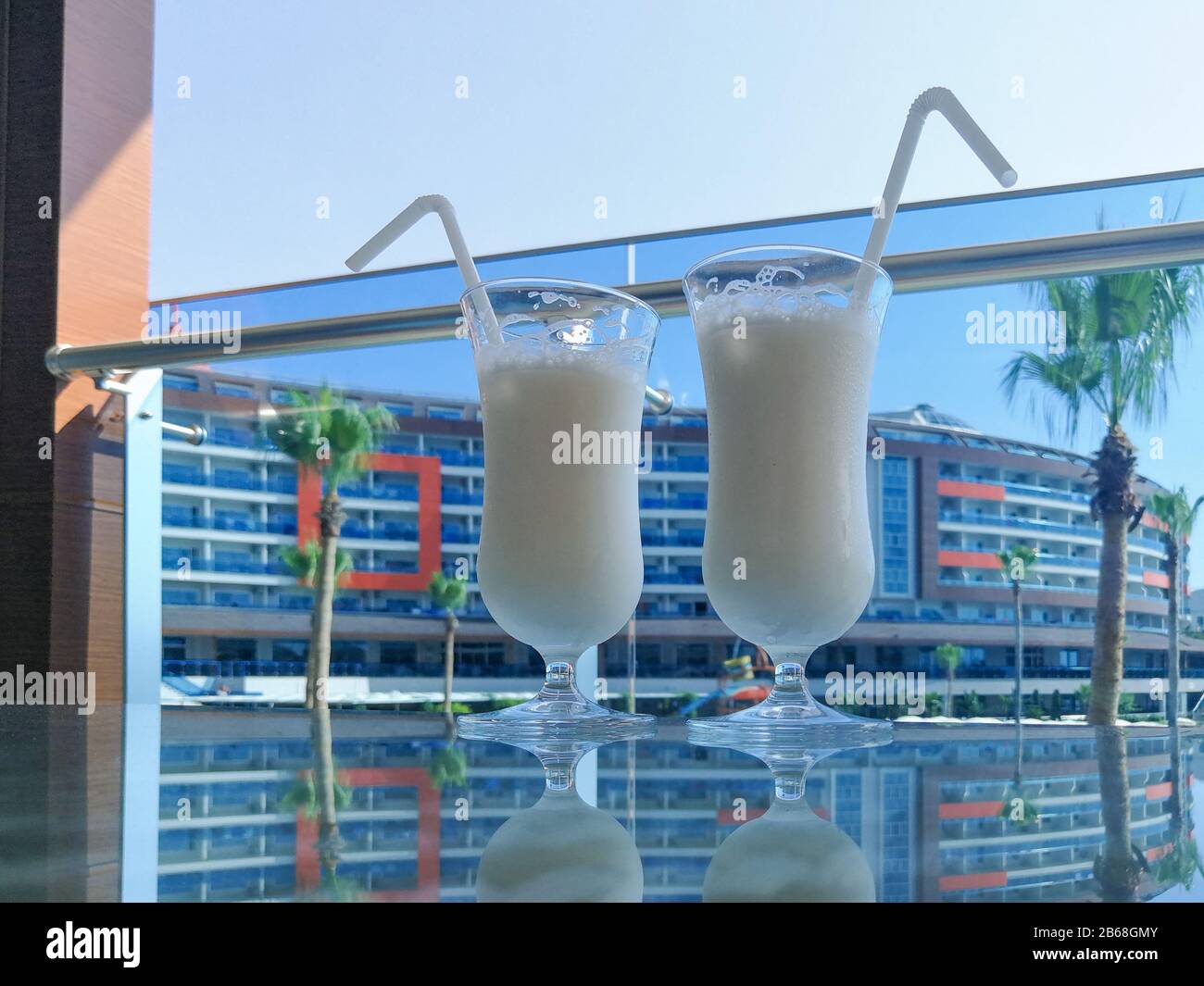 Pina colada alcoholic cocktail on a luxury hotel bar table Stock Photo ...