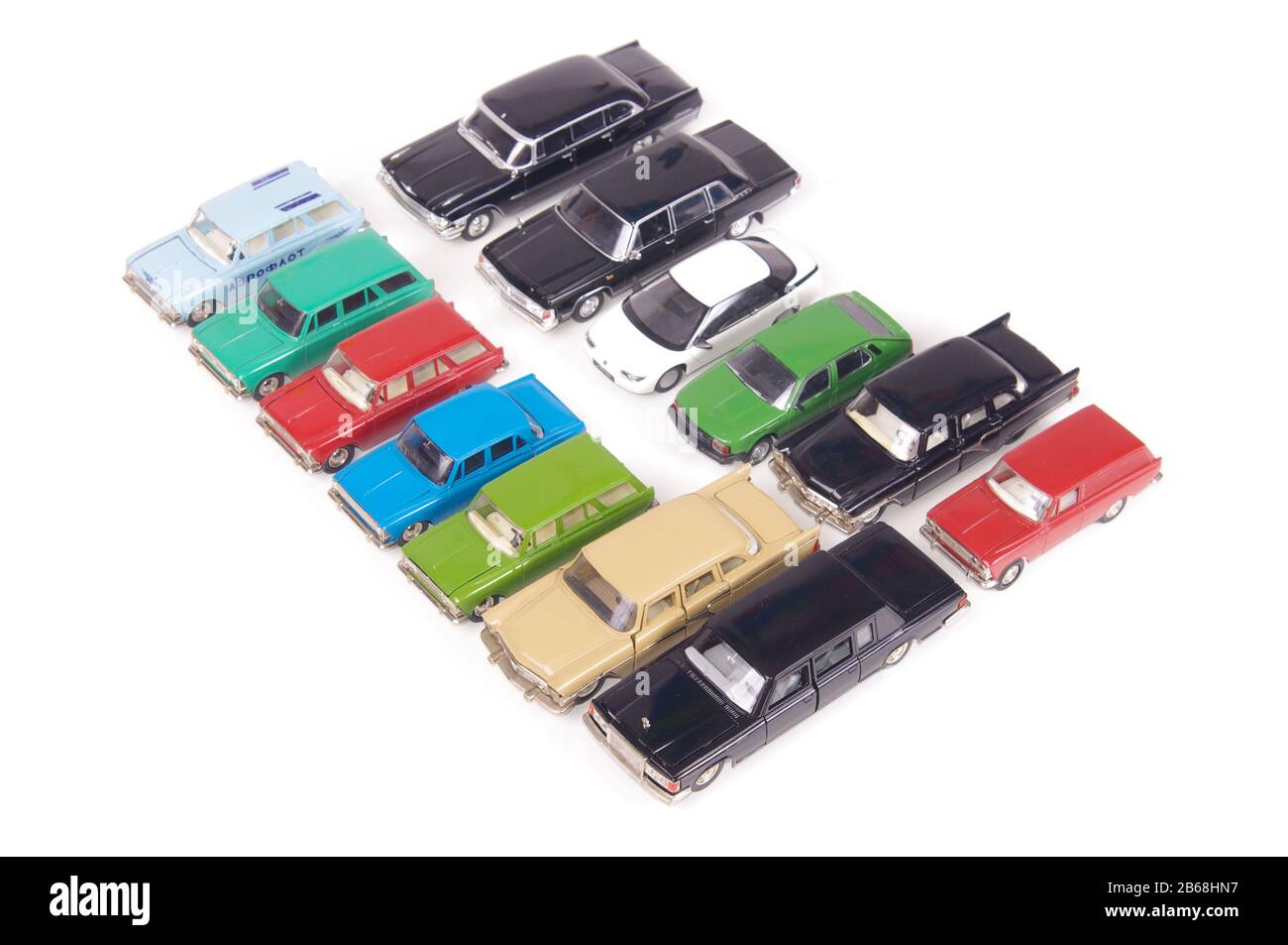 Collection of vintage metal diecast car models isolated on the white