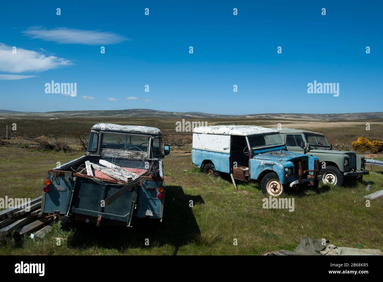 Land Rover cars in a settlement near Cape Dolphin, Falkland Islands