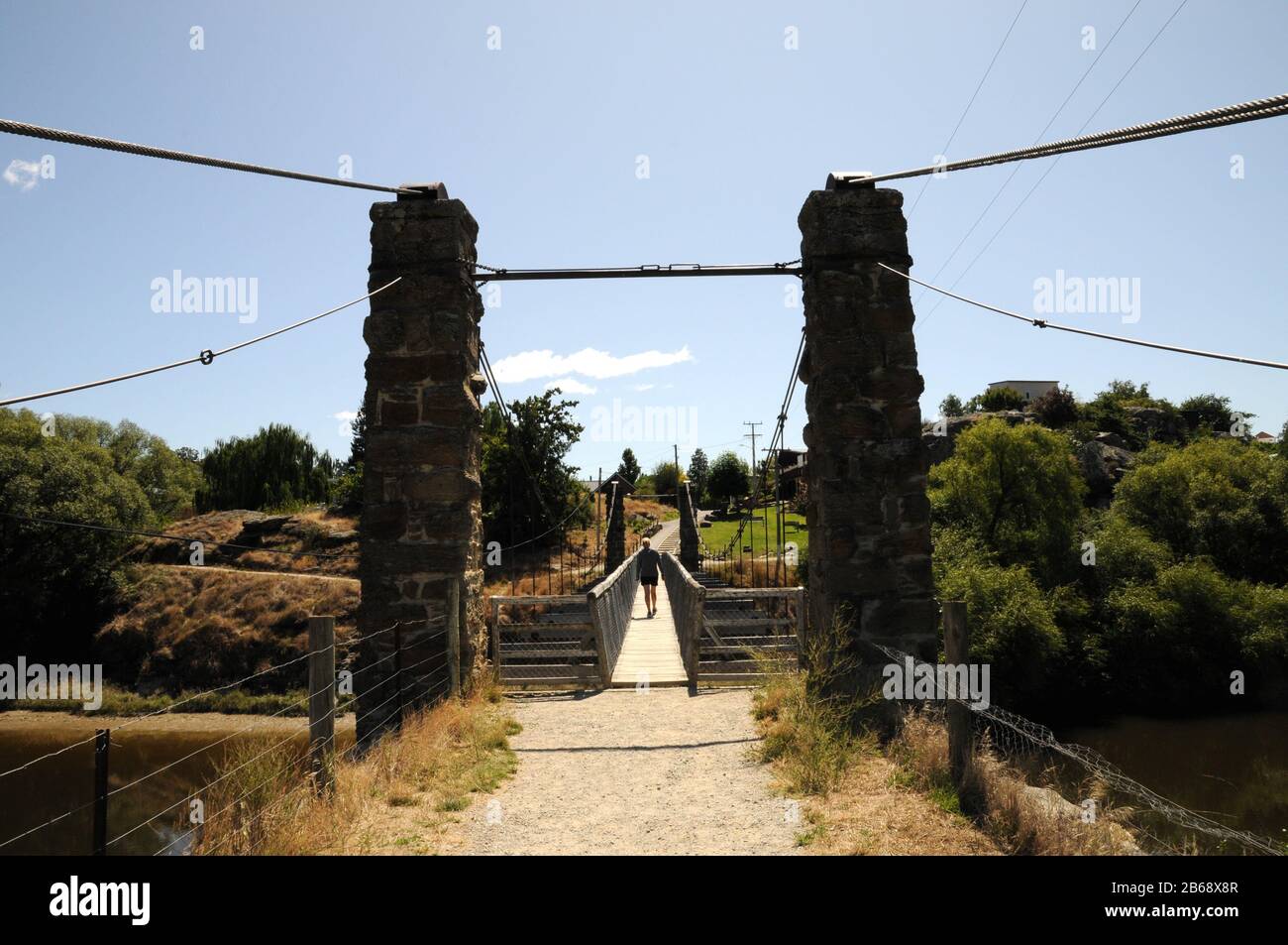 The bridge over the Manuherikia River in the town of Alexandra in Central Otago New Zealand. The restored bridge is known locally as Shaky Bridge! Stock Photo