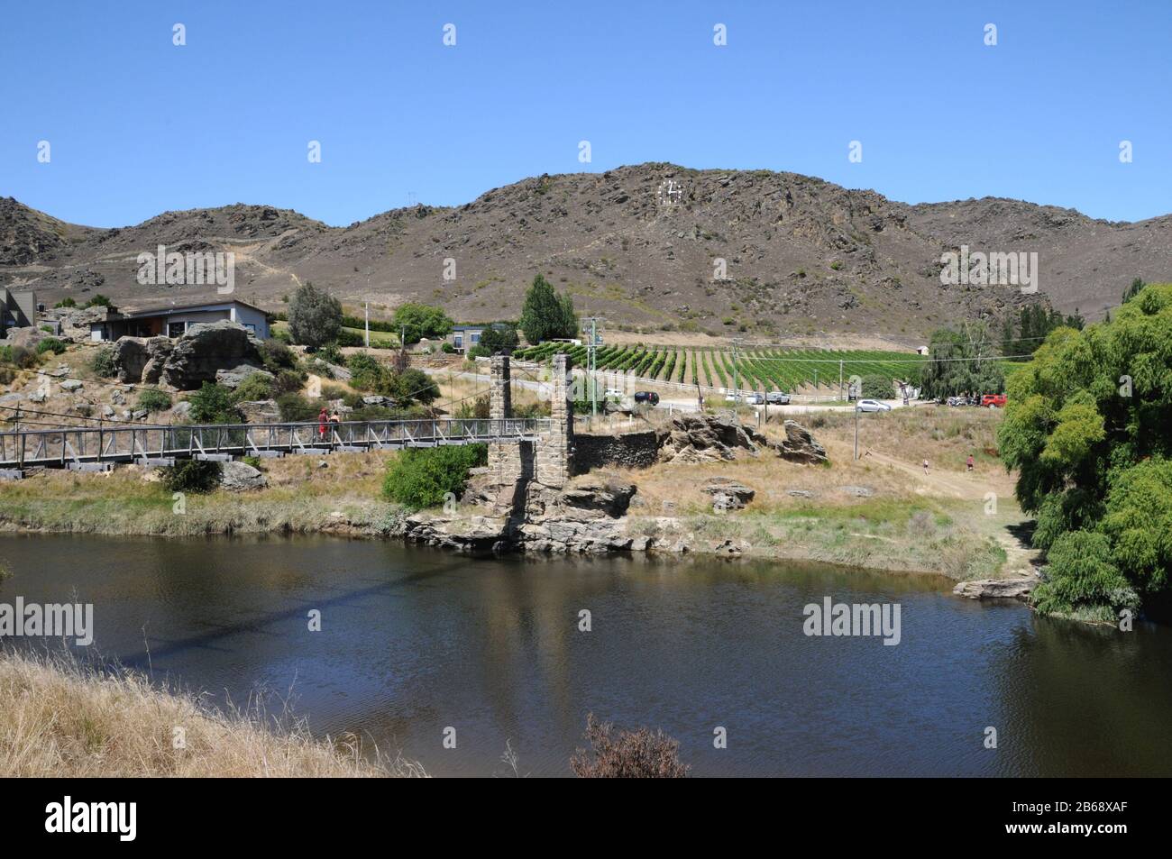 The bridge over the Manuherikia River in the town of Alexandra in Central Otago New Zealand. The restored bridge is known locally as Shaky Bridge! Stock Photo