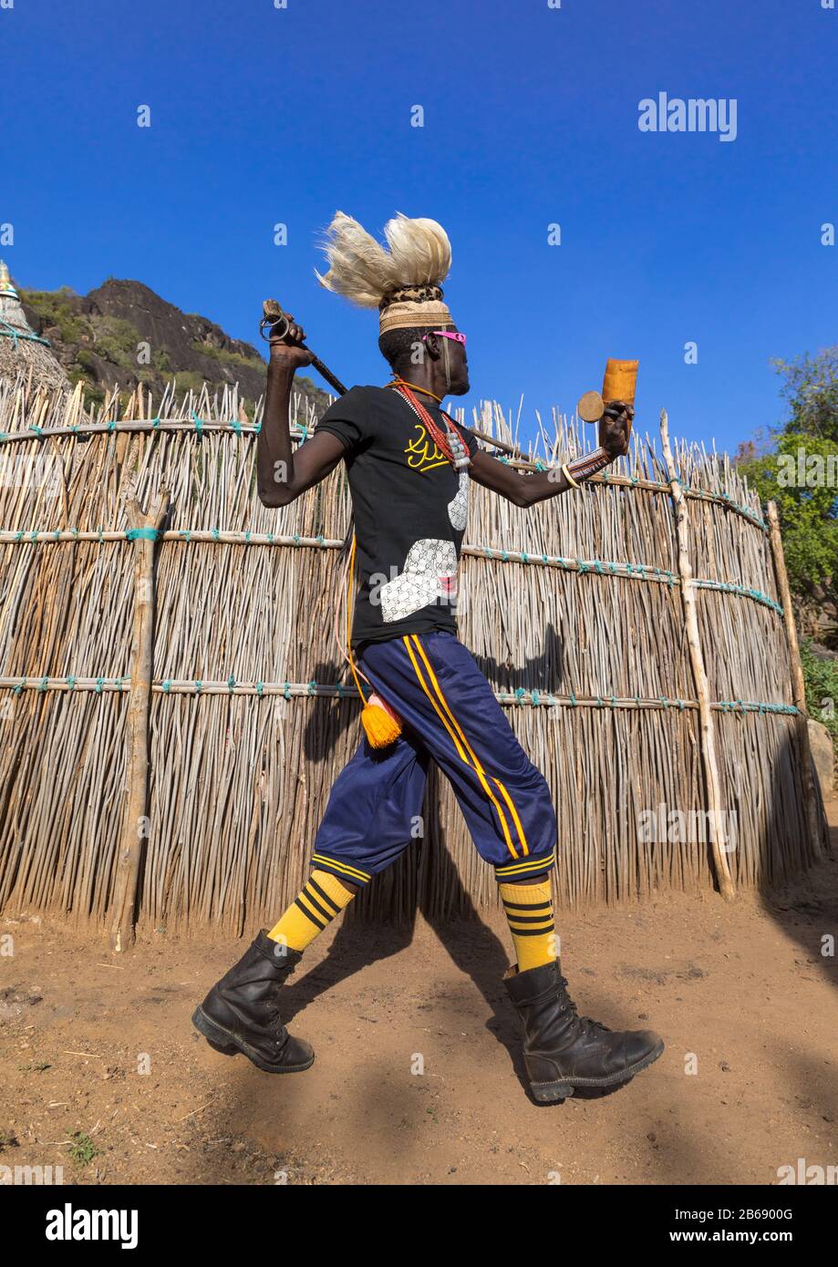 Larim tribe man dancing during a wedding ceremony, Boya Mountains, Imatong, South Sudan Stock Photo